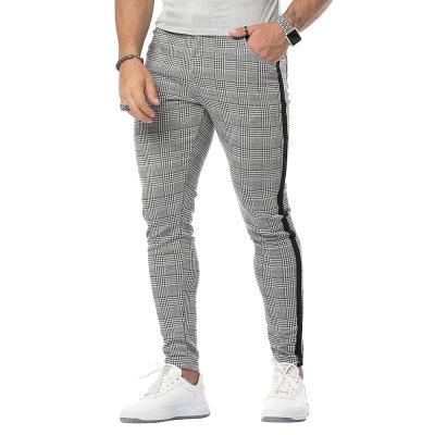 China Anti-wrinkle XH Europe and the United States street fashion brand pants men's small feet casual high elasticity plaid pants for sale