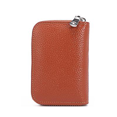 China Women's fashion short new cowhide zipper wallet high quality pure simple color anti-theft wallet for sale