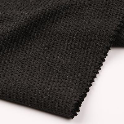 China 100% Wicking Grid Polyester Chinese Double Sided Jacquard Knitted Fabric for sale