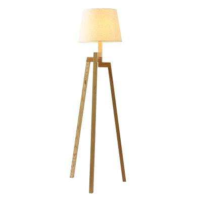 China Modern Nordic minimalist modern bedside study bedroom living room table lamp vertical Japanese solid wood floor lamp for sale