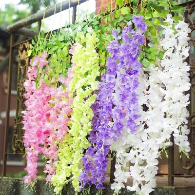 China Artificial Silk Wisteria Vine Ratta Wisteria Hanging Garland Silk Long Hanging Bush Flowers String Party Wedding Home Decor for sale