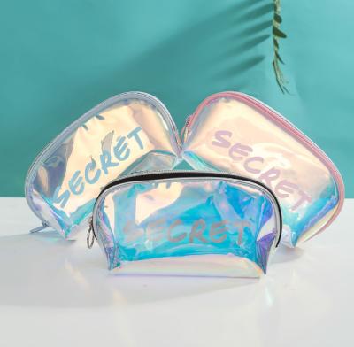 China New Design Beautiful Laser TPU Transparent Holographic Cosmetic Bag Classic Clear Lady Toiletry Bag for sale