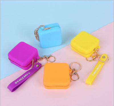 China Beautiful Customized Mini Custom Pocket Money Change Coin Purse Cheap Zipper Key Chain Candy Plain Color Small for sale