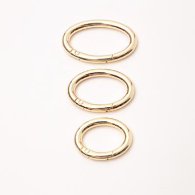 China Factory Supply High Quality Accessories Zinc Alloy Hardware Open Spring Ring Buckle Oval Coil for sale