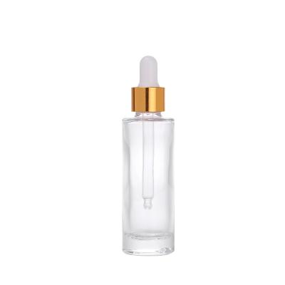 China Serum use cheap price essential oil 30ml gold cap essential oil clear glass spiral bottle with dropper for sale