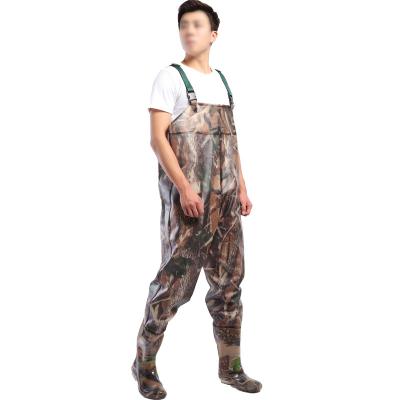 China Adjustable strap waterproof 100% waterproof waders PVC fabric camouflage fishing waders with boots fishing articles wading users PVC outer coating 38-47 for sale