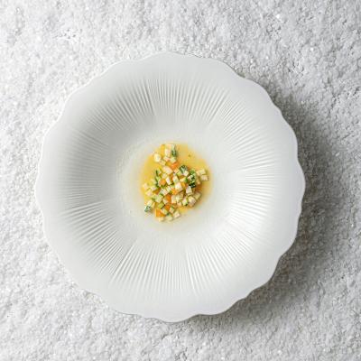 China Nordic Ceramic Reactive Luxury Dinner Dishes Matte White Porcelain Flower Shape Jiujiuju Wedding Event Viable Rental Tableware Factory for sale