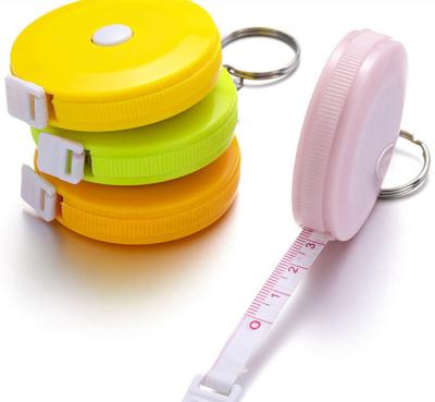 China Custom Tailor Portable Fiberglass Anti-fall 1.5cm Cloth Printed Body Tape Measure Tapeline Measuring Tape Keychain for sale