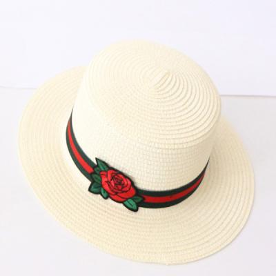 China Straw Summer Kids Straw Hat Lovely Bowknot Character Beach Sun Soft Cool Paper Hat for sale