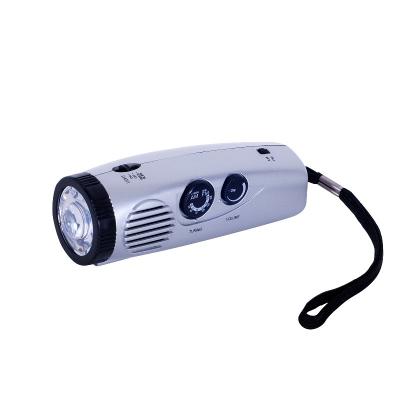 China AM/FM Radio Mini Portable Radio LED Light Battery Operated Handheld Radio Light With Backup Alarm for sale