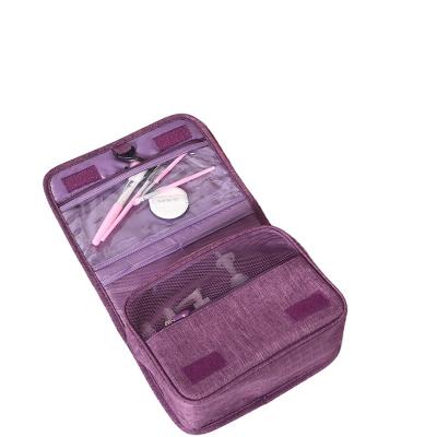 China Korean Travel Portable Cosmetic Bag Wet Dry Storage Separation Cation Cosmetics Bag Hook Wash Bag for sale