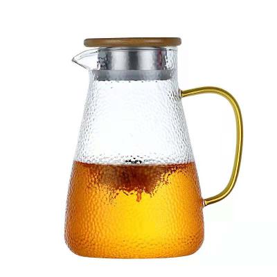 China Durable High Borosilicate Kettle Set Large Cooling Diameter With Handle Heat Resistant Glass Juice Jug Kettle for sale