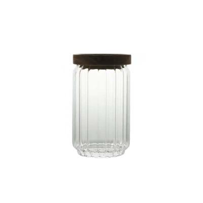 China Borosilicate Glass Stocked Storage Vessel With Lid Ridged And Smooth Faced Natural Wooden Clear Glass Canister Storage Jar for sale