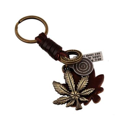 China Retro Personalized Leather Keychain Maple Leaf Dangle Key Chain For Women Men Keyholder for sale