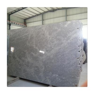 China Modern Amber White Granite Price 20mm And 50mm Large Granite Slabs for sale