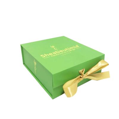 China Recyclable Custom Gift Packaging Foldable Magnetic Gift Box With Ribbon Closure for sale