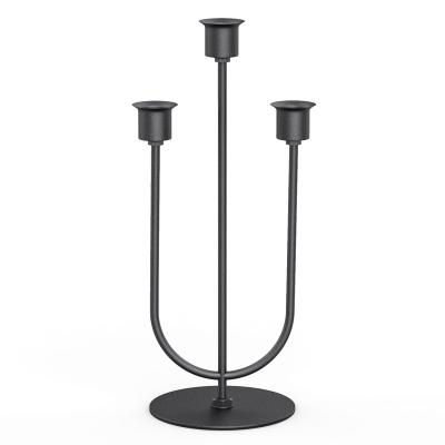 China Modern Nordic Fashion Design Novelty Style Iron Metal Candlestick Candle Holders Table Centerpieces for sale