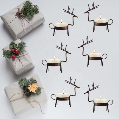 China Novelty best selling wedding supplies cute little deer noric metal tealight decorative candle holder for sale