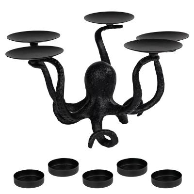 China Opens the fireplace decoration hot sale North American style octopus black luxury table candlestick holder for sale