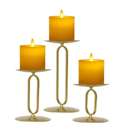 China New arrival best selling fashion design wrought iron gold table centerpieces wedding decoration candle holder for sale