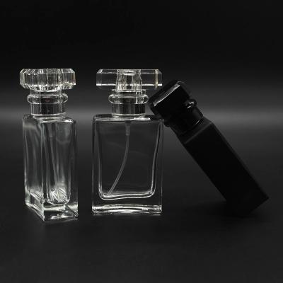 China Personal Packaging 30ml Rectangle Skin Care Perfume Glass Bottle Glass Perfume Spray Clear Black Bottle, Crimp Perfume Bottle for sale