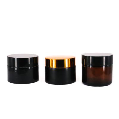 China Custom Round Glass Cosmetic Jar Factory Package Jar 1oz 2oz 4oz 8oz Glass Cosmetic Cream Jar With Lid for sale