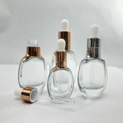 China Customized 30ml Personal Care Logo Transparent Flat Square Round Glass Dropper Bottles for sale