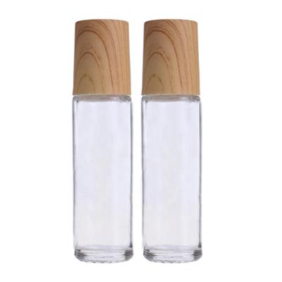 China 2021 cosmetics new wholesale roller bottle with bamboo cap 5ml 10ml 15ml for sale