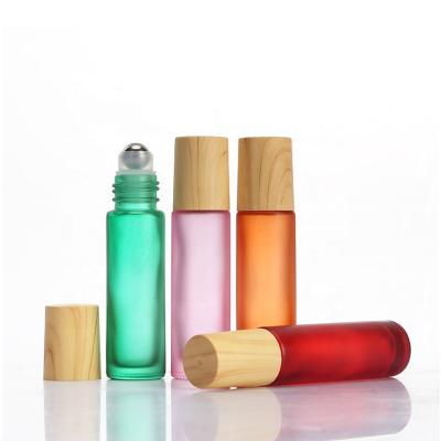 China 10ml Cosmetic Empty Frosted Glass Roll On Bottle Roll On Bottles With Trackball for sale