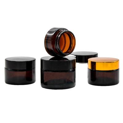 China 30g Cosmetic Empty 50g 60g 100g Amber Face Cream Glass Jar With Gold Lid for sale