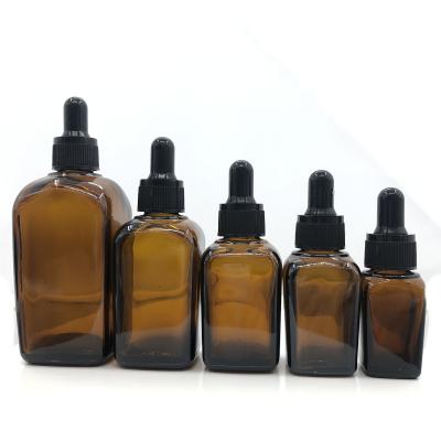 China New Cosmetic Amber Dark Glass Dropper Bottle 10ml 20ml 30ml 50ml Square Oil Glass Bottle With Dropper for sale