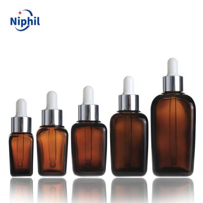 China Cosmetic square dropper glass bottle with 15ml 30ml 50ml 100ml for sale