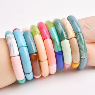 China New 2021 fashion hot selling colorful acrylic lucite curved tube bead big bracelets bamboo bead bracelets for sale