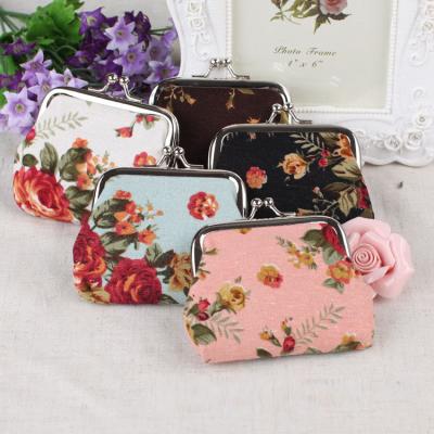 China Vintage Cute Floral Buckle Coin Clips Vintage Rose Fabric Coin Purse Pouch Kiss Lock Change Purse Wallets for sale