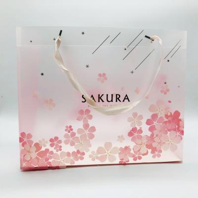 China Custom Sturdy Frosted Sakura Flower Plastic Bag Rope Handle for Purchasing for sale