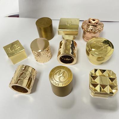 China Non Spill Square Shape Customized Engraved Logo High Quality Die Casting Cap Zamac Perfume Cap Capsule Perfume for sale