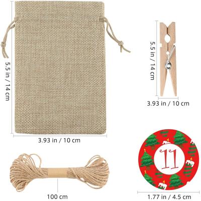 China 2021 Eco Friendly Santa Sacks Sticker Burlap Drawstring Christmas Gift Bags With Drawstring For Christmas Decoration for sale