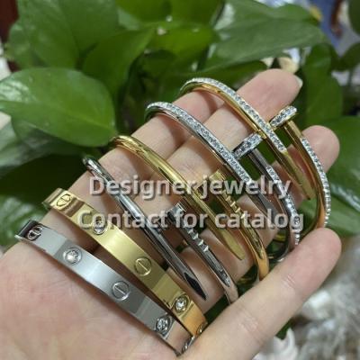 China TRENDY New Designer Bracelets Fashion Gold Plated Open Screw Famous Brand Bracelets Stainless Steel Women Nail Bangle Luxury Bracelets for sale