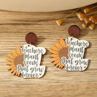 China FASHIONABLE Wholesale African Sunflower Earrings Wooden Dangling Letters Stud Earrings for Thank Teachers Jewelry for sale