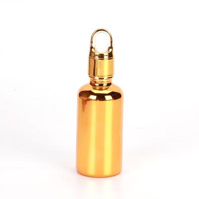 China Multifunctional Gold Glass Products Cosmetic Hot Selling Essential Oil Bottle For Cosmetic for sale