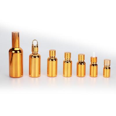 China Wholesale Practical Professional Cosmetic Factory Gold Glass Products Oil Dropper Bottle For Cosmetic for sale