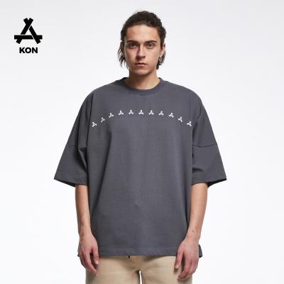 China Anti-wrinkle KON 300GSM short sleeve t-shirt off the shoulder high quality logo free size printing super oversized 100% cotton boy T-shirts for sale