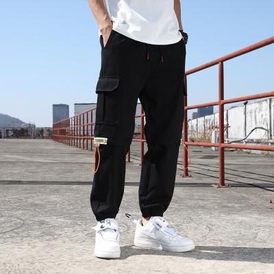 China Korean style Europe and the United States leisure sports spring 2021 new cargo popular logo men's students nine point leg pants for sale