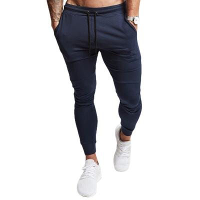 China Leisure muscle brothers color men's small foot sports and sports bright simple diet casual pants for sale