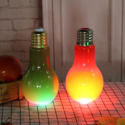 China Non Spill Luminescent Plastic Tea Bottle Light Bulb Yogurt Cup Juice Milk Tea Shop Creative Beverage Bottle for sale