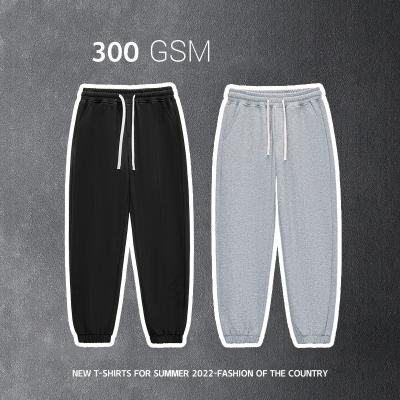 China Anti-wrinkle custom plus size mens pants mens clothing sports leisure jogging pants street wear hoodie pants 300gsm for sale