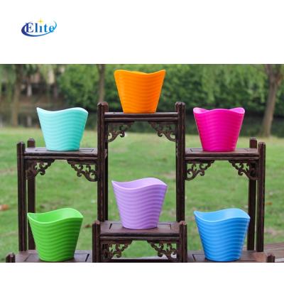 China Various Size Colorful Plastic Flower Pots Large Modern Outdoor Plastic Plant Pots for sale