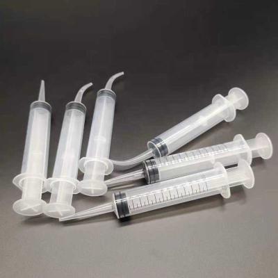 China Dental Sector Curved Dental Service Disposable Plastic Syringes Disposal Suction Syringe for sale