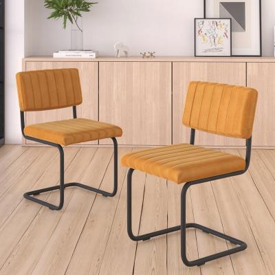 China Factory direct sale modern design velvet upholstered dining chair side chair with metal legs chair cantilever modern dining for sale