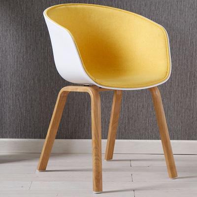 China Modern wholesale plastic covered linen fabric armchair lounge chair cafe hotel restaurant chair nodric modern plastic chair for sale